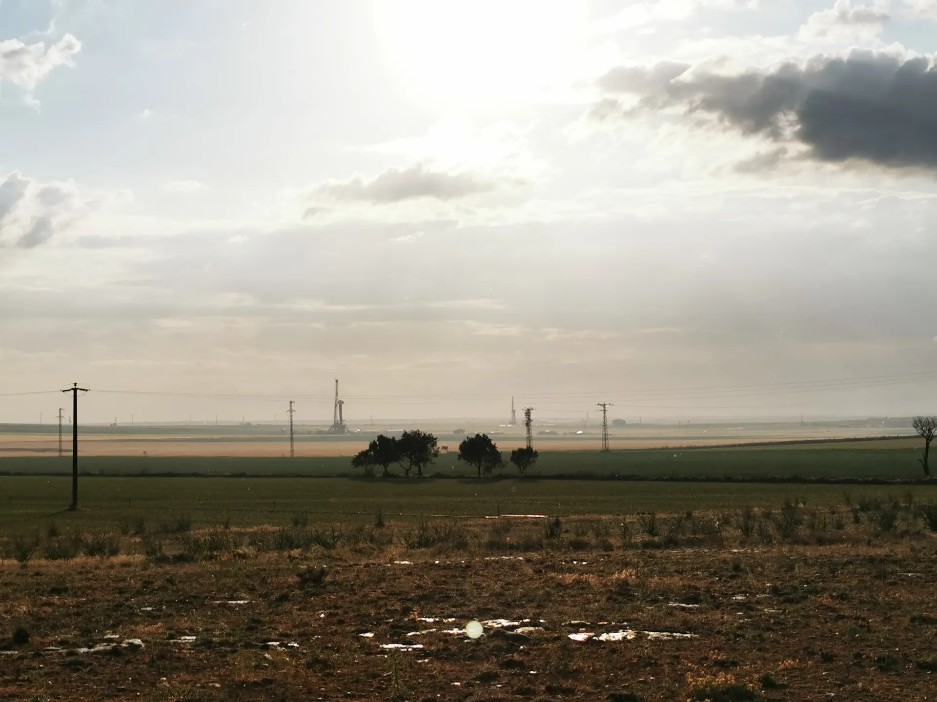 Rig visible across a distant field